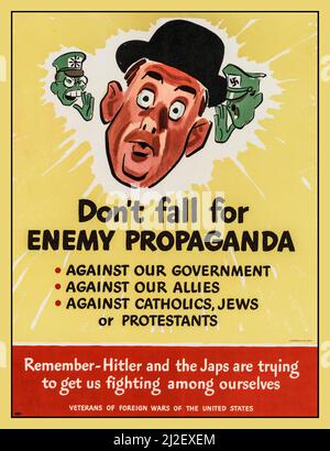 Vintage WW2 American Propaganda Poster 'Don't Fall for Enemy Propaganda '   World War II Information Propaganda Posters  propaganda World War II era poster 1943 'remember -Hitler and the Japs (Adolf Hitler and Tojo Hideki) are trying to get us fighting among ourselves' against catholics jews protestants  Illustrated by Jack Betts USA  'Veterans of foreign wars of The United States' Stock Photo