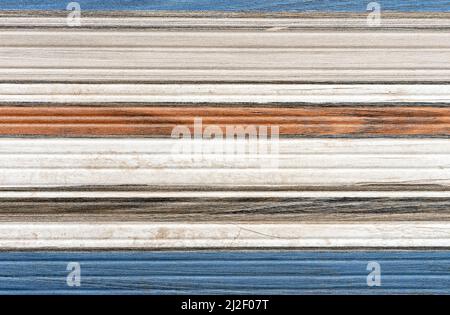 Ceramic tile with blue, beige and brown stripes and wood texture. Stock Photo