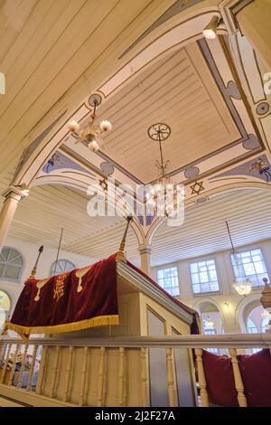 The painted yellow and blue central, square wood bima. At the Algazi synagogue in Izmir, Turkey. Stock Photo