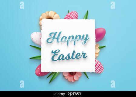 Happy Easter greeting card on square paper surrounded by Easter decorations. Blue background, top view, flat lay Stock Photo
