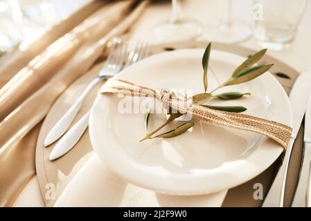 Its time to dine and celebrate this beautiful union. Still life shot of a decorated table setting at a wedding reception. Stock Photo