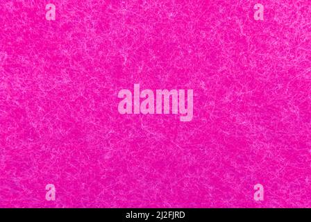 Violet or purple fabric with fine white threads. Felt material hot pink Stock Photo