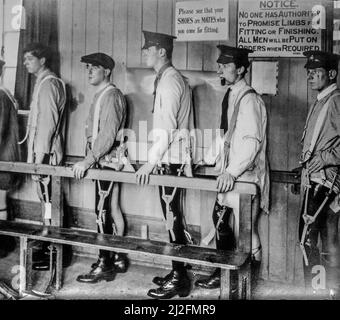 British WWI soldiers / leg amputees fitted with artificial limbs / prosthetic legs at Roehampton House hospital in London during First World War One Stock Photo