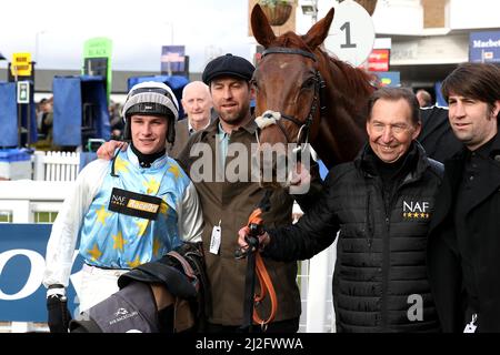 Jockey Jack Tudor (left) with horse Stringtoyourbow after winning the Thistle Cabs Group Handicap Hurdle during the Coral Scottish Grand National Ladies Day at Ayr Racecourse, Ayr. Picture date: Friday April 1, 2022. Stock Photo