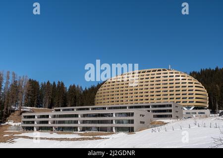 Davos, Switzerland, March 23, 2022 Facade of the modern Hotel Alpengold on a sunny day Stock Photo