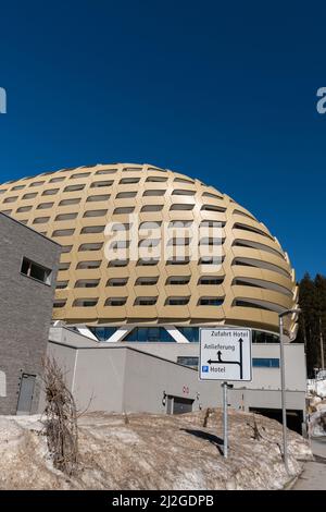 Davos, Switzerland, March 23, 2022 Facade of the modern Hotel Alpengold on a sunny day Stock Photo