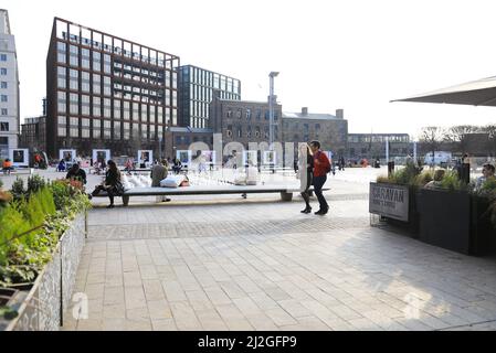 A bright early spring day on Granary Square at Kings Cross, in north London, UK Stock Photo