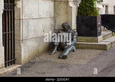 Bergen, Norway - 28 May 2018: A statue entitled The homeless by sculptor, Arne Maeland. Monument to man at the entrance to the bank. Bergen, Norway, E Stock Photo