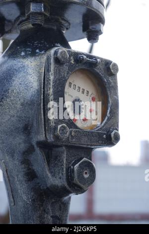 Steampunk-style water pump with valves and pressure gauges Stock Photo