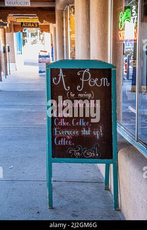 2018 09 23 Taos New Mexico USA - Sign on sidewalk  in front of Coffee Shop in downtown Taos with Poem - Coffee- Everyone Shut Up Stock Photo