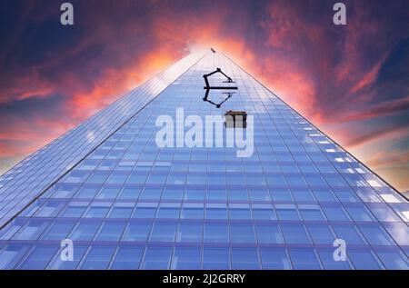 Concept; Futuristic city; The Shard London, looking up to a dramatic sky at sunset, London Shard skyscraper, Central London UK Stock Photo
