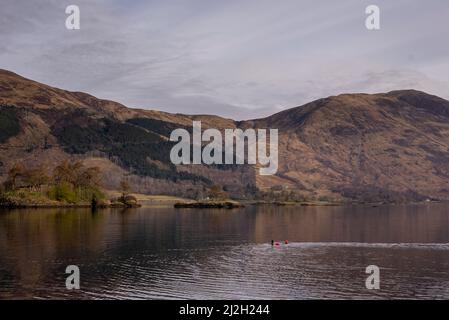 Glencoe, UK. 01st Apr, 2022. Two women swim in Loch Leven in the Highlands of Scotland April 1, 2022 in Glencoe, Scotland. Photo by Ken Cedeno/Sipa USA Credit: Sipa USA/Alamy Live News Stock Photo