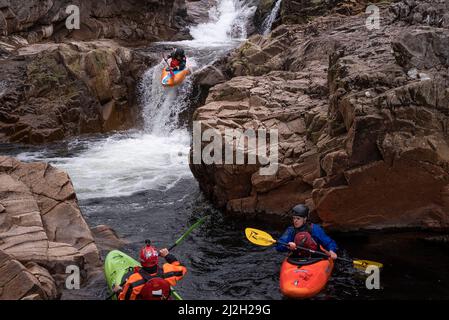 Glencoe, UK. 01st Apr, 2022. Members of the Imperial College Canoe Club paddle down the River Etive off the Glen Etive Road in the Highlands of Scotland April 1, 2022. Glen Etive road was featured in the movie 'Skyfall.' Photo by Ken Cedeno/Sipa USA Credit: Sipa USA/Alamy Live News Stock Photo