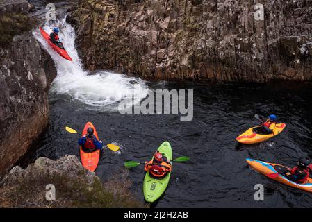 Glencoe, UK. 01st Apr, 2022. Members of the Imperial College Canoe Club paddle down the River Etive off the Glen Etive Road in the Highlands of Scotland April 1, 2022. Glen Etive road was featured in the movie 'Skyfall.' Photo by Ken Cedeno/Sipa USA Credit: Sipa USA/Alamy Live News Stock Photo