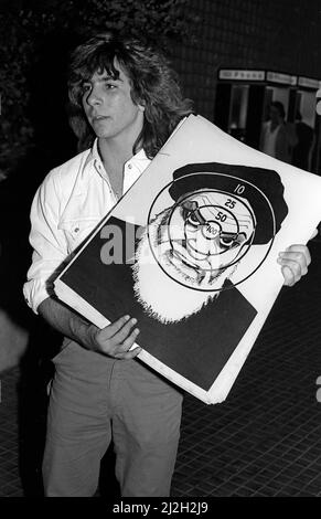 Man with posters depicting Iranian ruler Ayatollah Khamenei with a target  over his head in Hollywood, CA, 1979 Stock Photo - Alamy