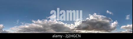 blue sky hdr 360 panorama with sun hid behind the clouds in seamless projection with zenith for use in 3d graphics or game development as sky dome or Stock Photo