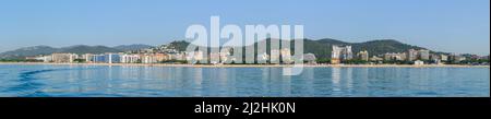 Panoramic view of Costa Brava coastline from the sea towards Santa Susanna and Malgrat de Mar location, Catalonia, Spain. Stock Photo