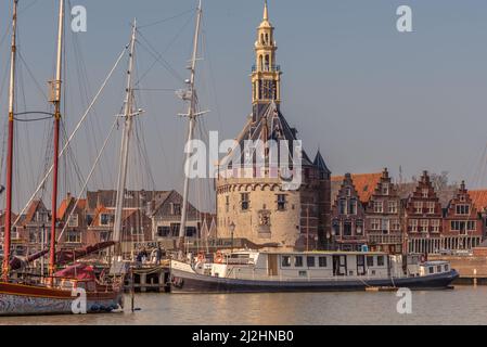 Hoorn, Netherlands, March 2022. The historic defense tower at the harbor entrance of Hoorn. High quality photo Stock Photo