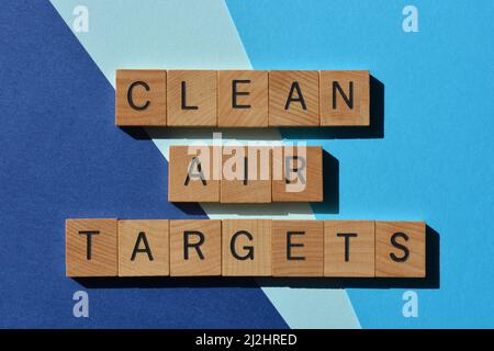 Clean Air Targets, words in wooden alphabet letters isolated on blue background Stock Photo