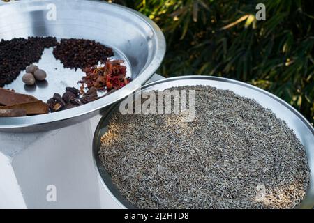 A close up shot of dried cumin in a big metal bowl. Stock Photo