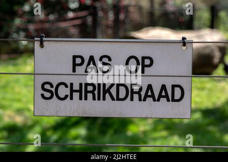 General Warning Sign Electrical Fence At The Artis Zoo At Amsterdam The Netherlands Stock Photo