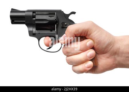 Male hand holding small black pistol, isolated on white background Stock Photo