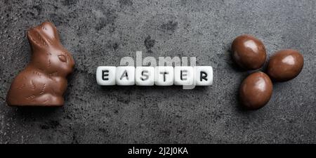 Delicious Easter holiday chocolate bunny, eggs and sweets Stock Photo