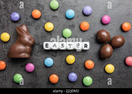 Delicious Easter holiday chocolate bunny, eggs and sweets Stock Photo