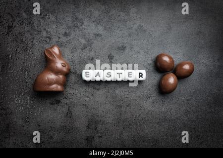 Delicious Easter holiday chocolate bunny, eggs and sweets Stock Photo