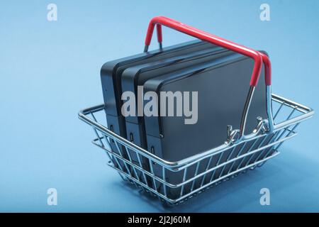 A stack of hard drives in a basket. Stock Photo