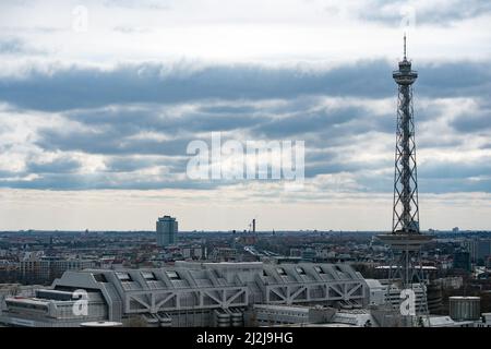02 April 2022, Berlin: A broad band of clouds moves along behind the radio tower and exhibition center ICC (Internationales Congress Centrum). Photo: Paul Zinken/dpa Stock Photo