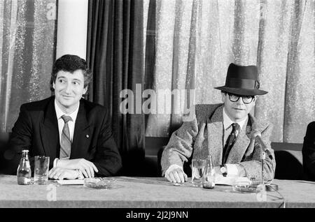 Left to right, Paul White (From Hanover Drew) and Elton John, pictured during a press statement about Elton John's £2 Million sale of Watford FC. 8th December 1987. Stock Photo