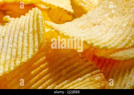 Potato Chips Close-Up. Fast Food. Macro Food background Stock Photo