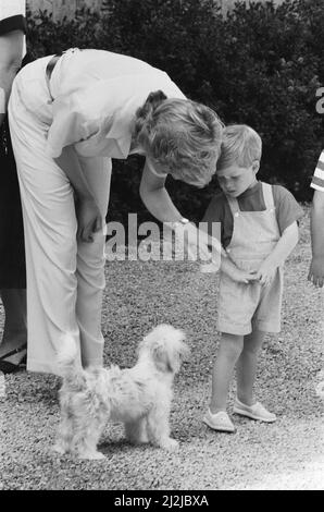 Prince Harry and his mother Princess Diana.He is on holiday with his family, Prince William, Princess Diana and Prince Charles in Majorca, Balearic Islands, Mediterranean  Picture taken 15th September 1987 Stock Photo