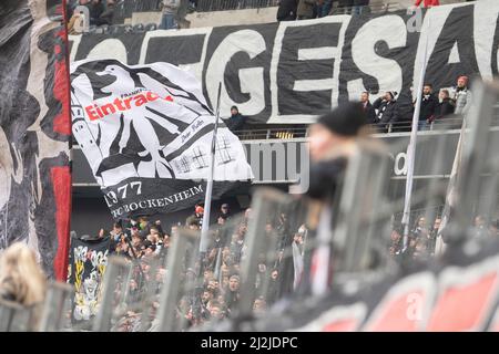 02 April 2022, Hessen, Frankfurt/Main: Soccer: Bundesliga, Eintracht Frankfurt - SpVgg Greuther Fürth, Matchday 28, Deutsche Bank Park. Fans in the Nordwestkurve wave flags. Photo: Sebastian Gollnow/dpa - IMPORTANT NOTE: In accordance with the requirements of the DFL Deutsche Fußball Liga and the DFB Deutscher Fußball-Bund, it is prohibited to use or have used photographs taken in the stadium and/or of the match in the form of sequence pictures and/or video-like photo series. Stock Photo