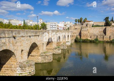 Historic roman bridge (Puente Romana) over the Guadiana river in Merida, Spain Stock Photo