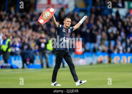 Leeds, UK. 02nd Apr, 2022. Josh Warrington walks out onto the field at Elland Road displaying his IBF featherweight belt ahead of this afternoon's game in Leeds, United Kingdom on 4/2/2022. (Photo by James Heaton/News Images/Sipa USA) Credit: Sipa USA/Alamy Live News Stock Photo