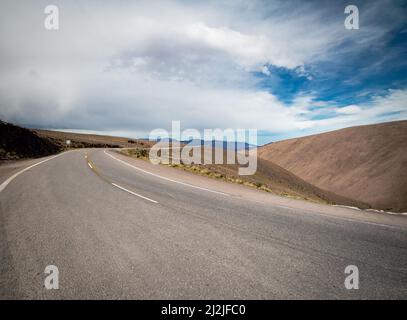 Scenic Mountain Road in a desertic landscape Stock Photo