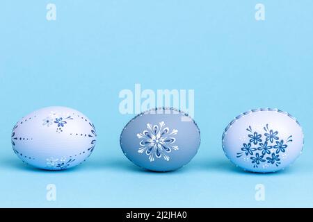 Easter eggs on blue background Stock Photo