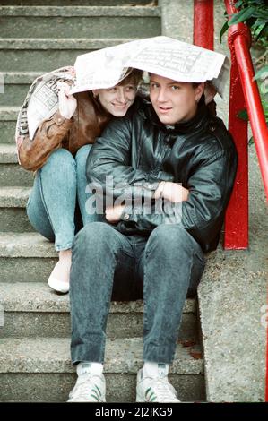 Audience gather outside the Wembley arena prior to the Michael Jackson concert. 15th July 1988. Stock Photo