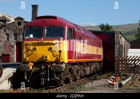 Class 47 locomotive 47785 at Kirkby Stephen East (Stainmore railway) wearing full EWS livery Stock Photo