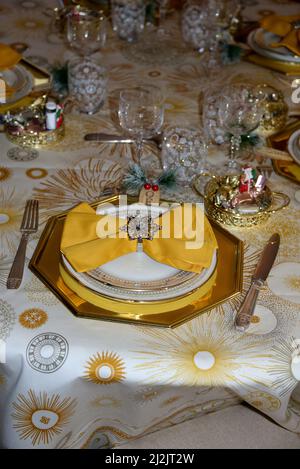 Table laid for a festive meal for Christmas Stock Photo