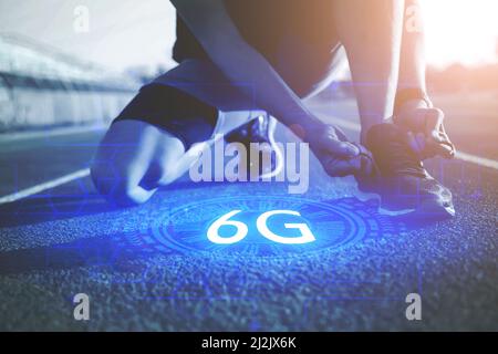 Athletes are about to start preparing for jogging on the treadmill. There is a 6g default message, 6g network startup concept Stock Photo