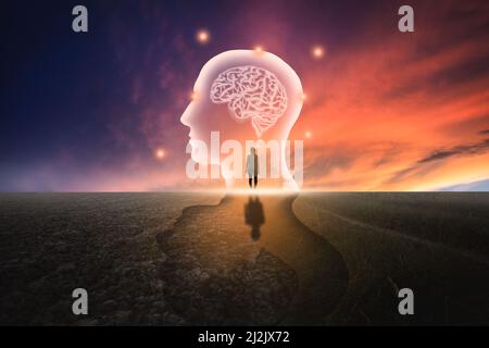 A virtual man with symbolic neurons in the brain Freedom of thought Creative ideas, ideas and innovations / Evening sky background Stock Photo