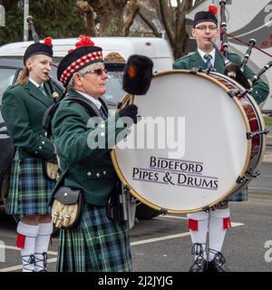 BIDEFORD, ENGLAND - MARCH 6 2022: Bideford Pipes and Drums band with bagpipes. Stock Photo