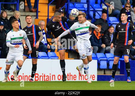 Birkenhead, UK. 02nd Apr, 2022. Elliot Nevitt of Tranmere Rovers and Danny Devin e of Carlisle United during the Sky Bet League Two match between Tranmere Rovers and Carlisle United at Prenton Park on April 2nd 2022 in Birkenhead, England. (Photo by Tony Taylor/phcimages.com) Credit: PHC Images/Alamy Live News Stock Photo
