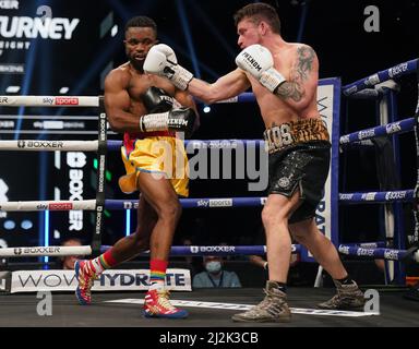 Michael Likalu (left) and Carl Turney in the welter weight bout at at the Utilita Arena, Newcastle. Picture date: Saturday April 2, 2022. Stock Photo