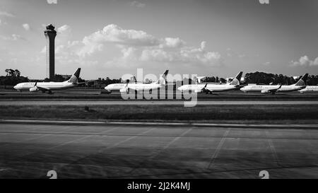 United Airlines airplanes parked near a runway at George Bush Intercontinental Airport in Texas, U.S.A., during the COVID-19 pandemic. Stock Photo