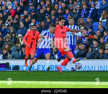 Brighton, UK. 02nd Apr, 2022. Mathias Normann of Norwich City and Leandro Trossard of Brighton and Hove Albion during the Premier League match between Brighton & Hove Albion and Norwich City at The Amex on April 2nd 2022 in Brighton, England. (Photo by Jeff Mood/phcimages.com) Credit: PHC Images/Alamy Live News Stock Photo