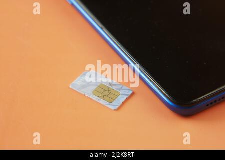 A sim card for a smart phone on table  Stock Photo